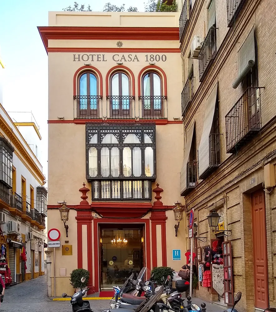 Hotel Casa 1800 Sevilla facade on a narrow Santa Cruz street